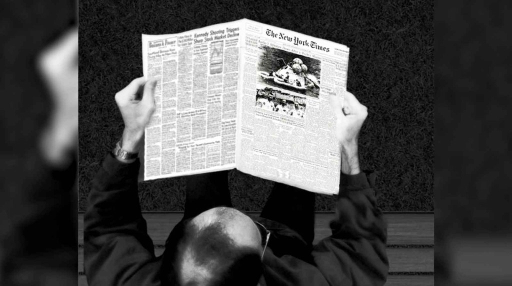 man-reading-newspaper